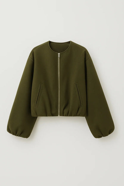 Korte Damesjas | Ritssluiting en Pofmouwen | Strakke Minimalistische Look