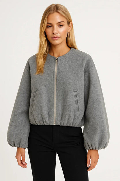 Korte Damesjas | Ritssluiting en Pofmouwen | Strakke Minimalistische Look