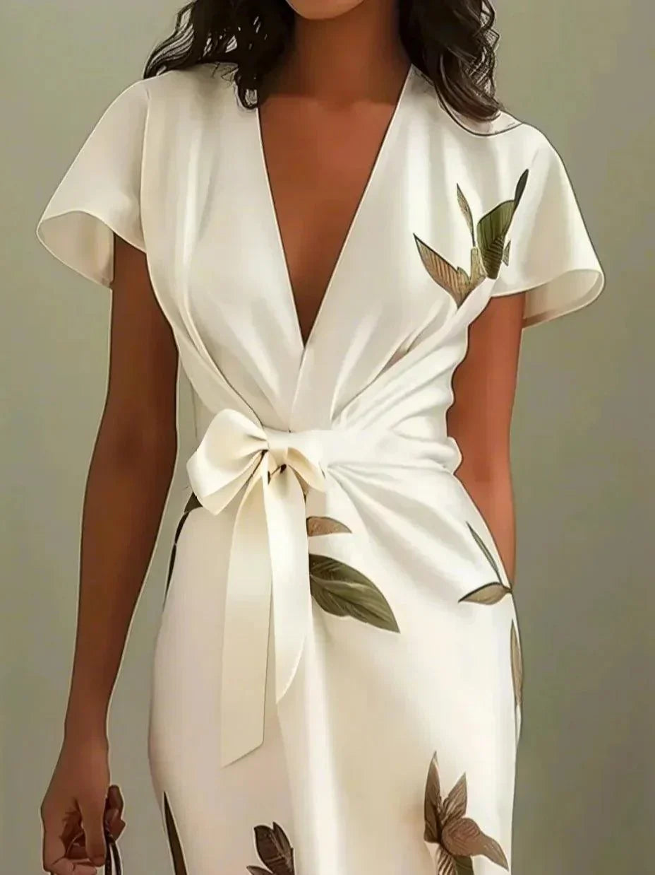 Maud - Elegante Bruiloft Gastenjurk Dames met Diepe V-hals en Bladprint