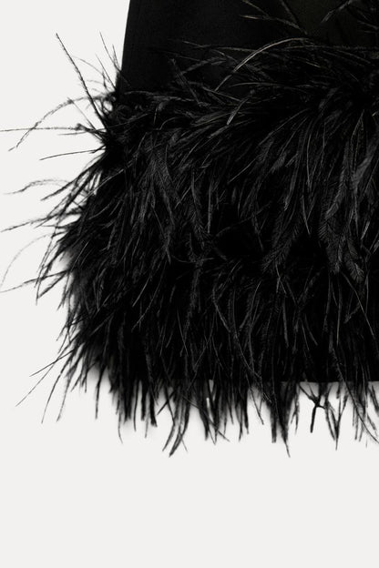 Sanne - Feestjurk dames mini elegant en aansluitend met glitter en lange mouw